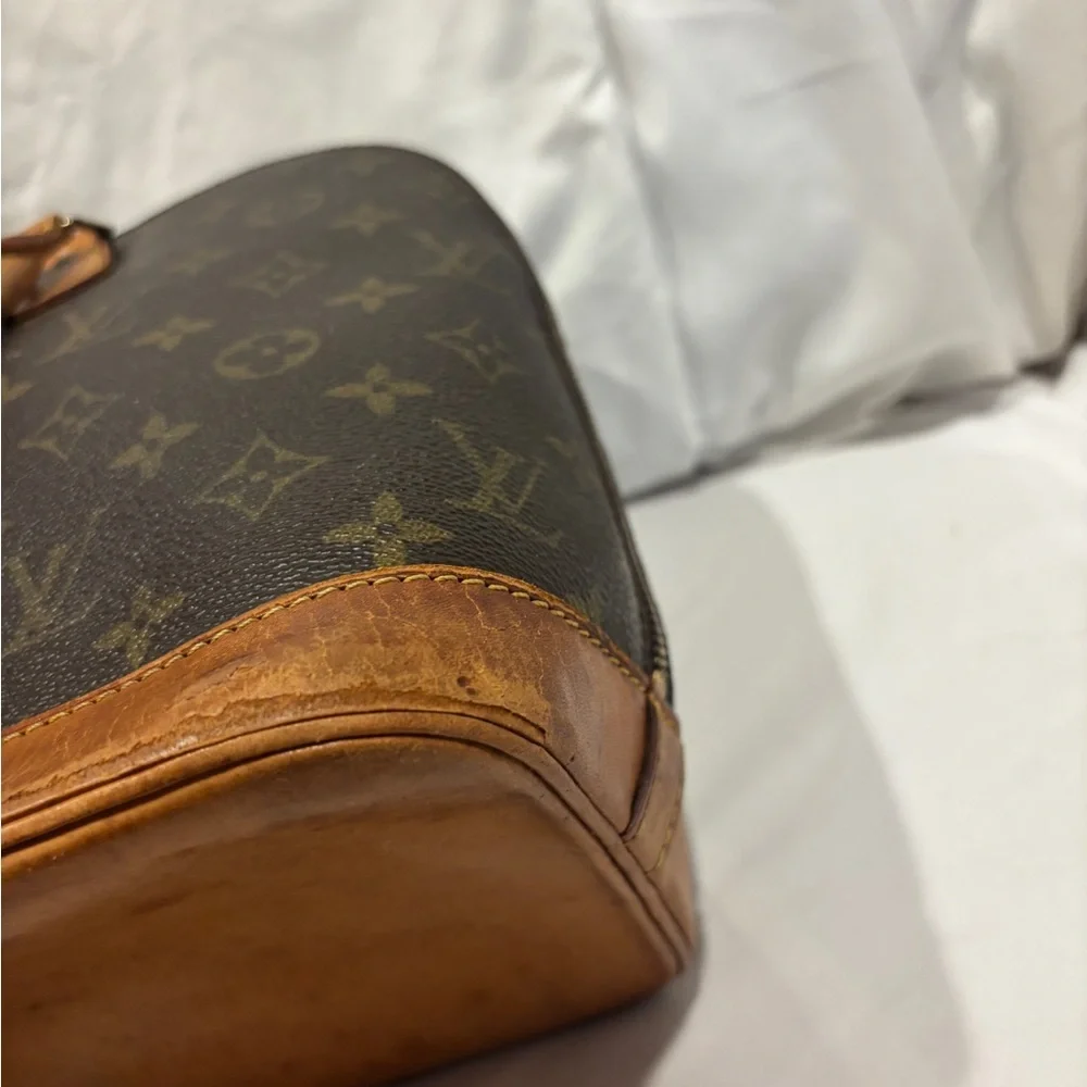 Louis Vuitton Alma Monogram Coated Canvas Handbag - Picture 9 of 16